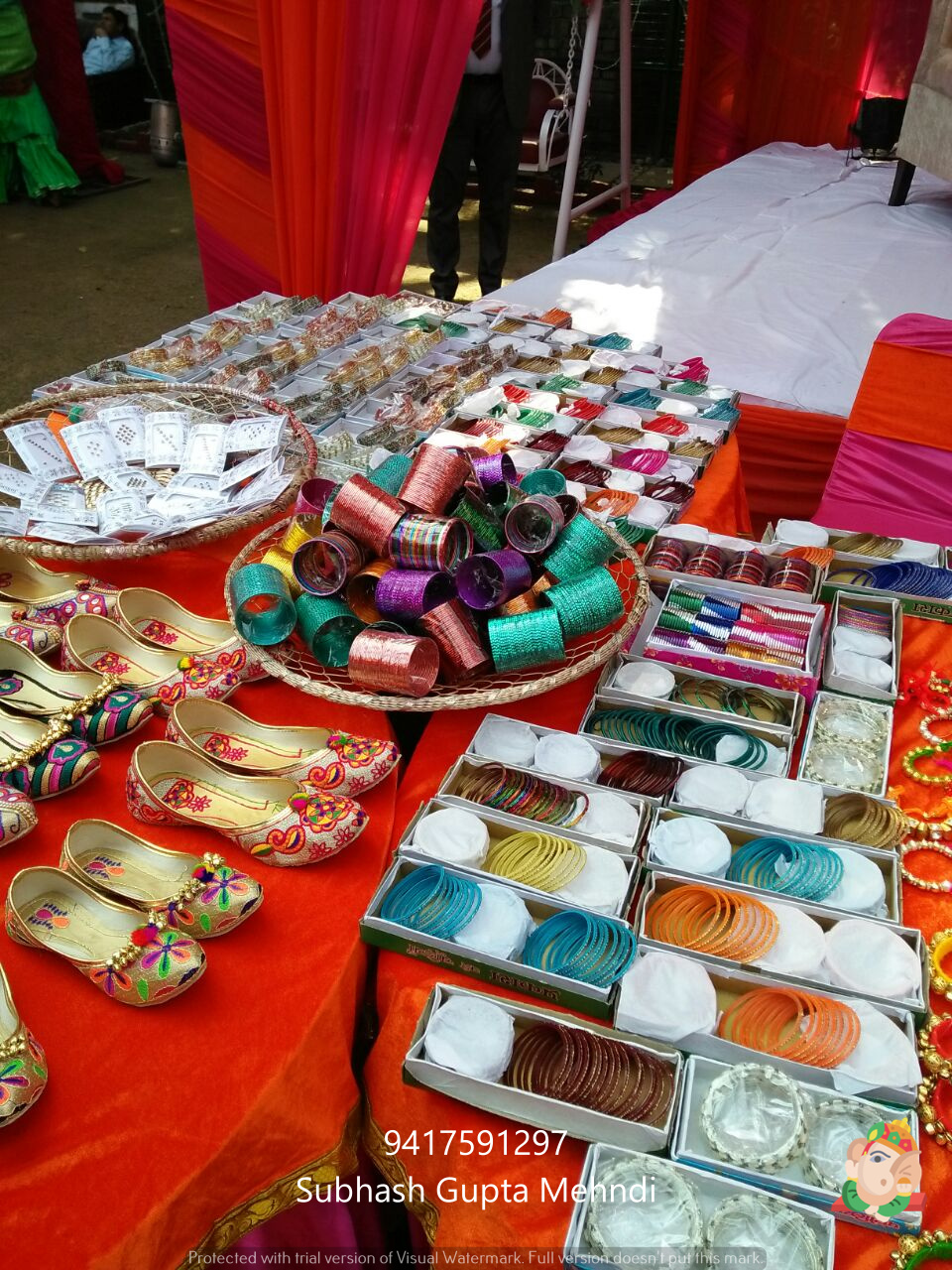 mehndi design ceremony and churi, jutti, kade, prandi stall at indian wedding and functions