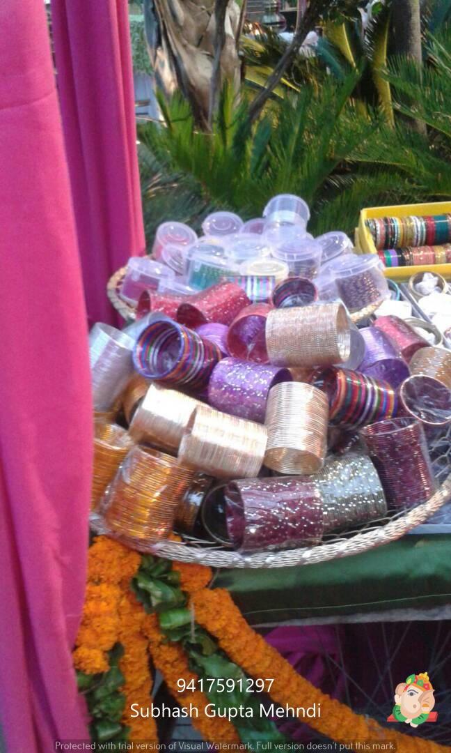 mehndi design ceremony and churi, jutti, kade, prandi stall at indian wedding and functions